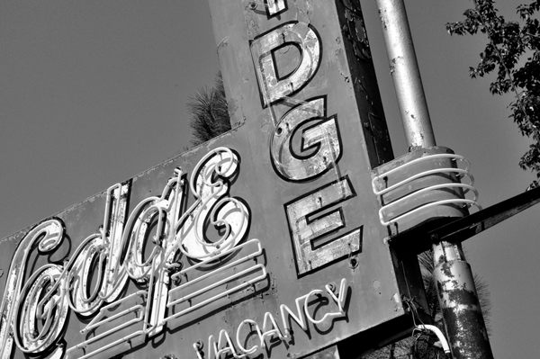 Old Sign at an Angle in Black and White